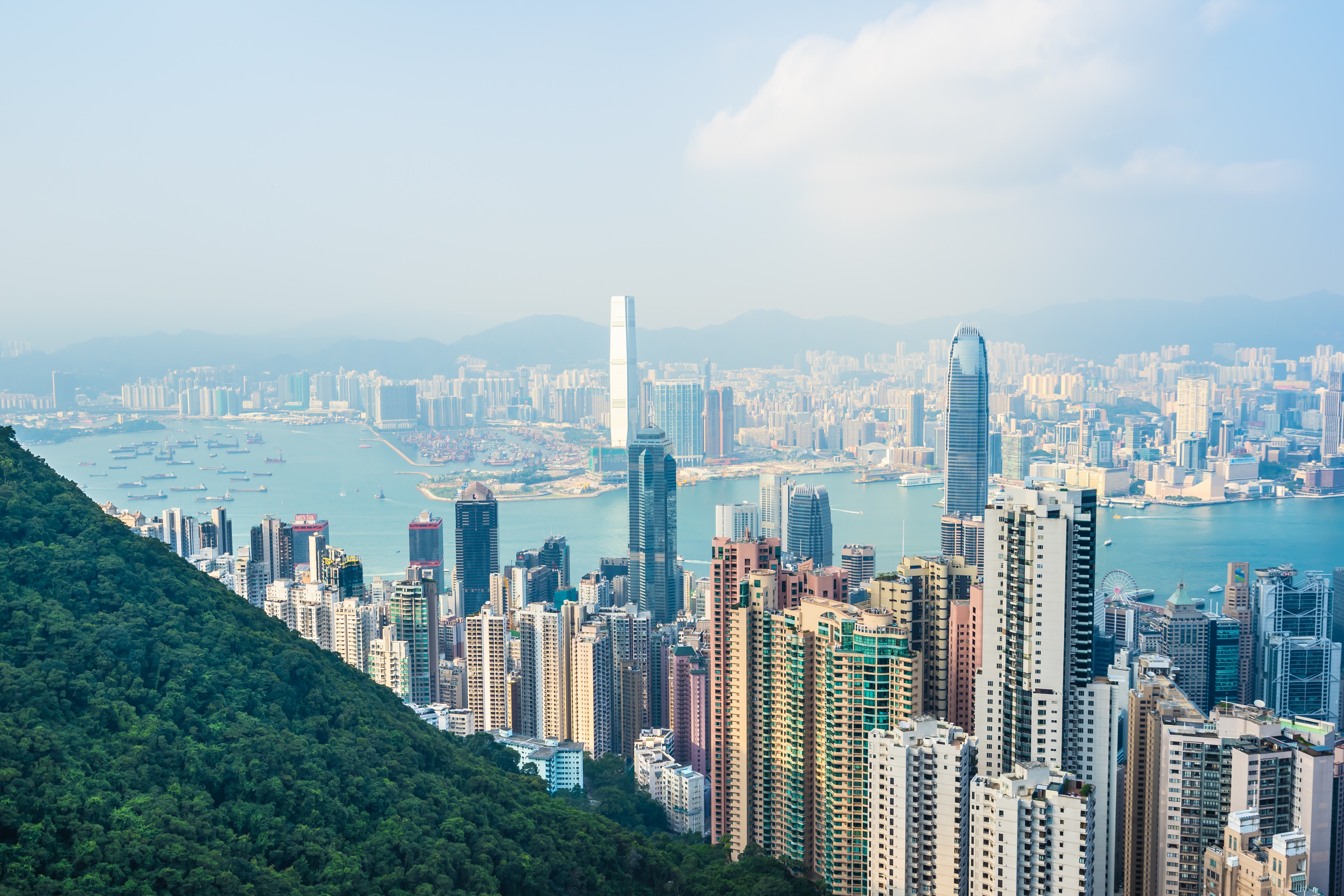 Beautiful architecture building exterior cityscape of hong kong city skyline with blue sky background